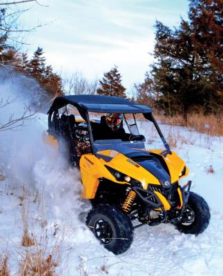 2017.can-am.maverick.yellow.front.riding.in-snow.jpg