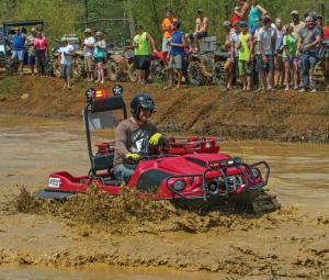 2016.argo.avenger8x8lx.red.front-right.riding.through-mud.jpg
