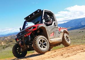 2017.cub-cadet.challenger550.red.front-left.riding.on-trail.jpg
